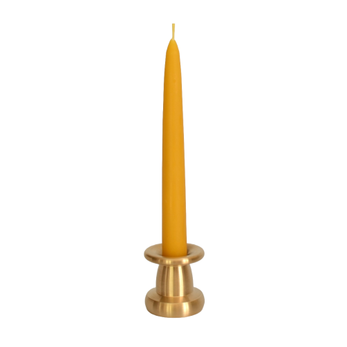 solid brass candle holder with a tall tapered dinner candle