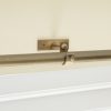 solid brass curtain centre bracket shown with curtain pole