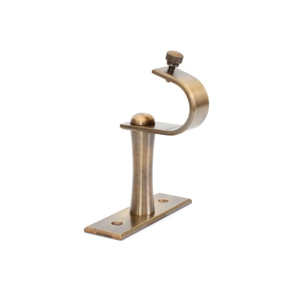 solid brass curtain centre bracket in antique finish