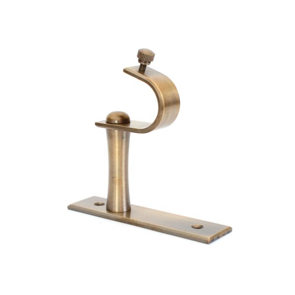 solid brass curtain end bracket in antique finish