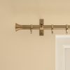 solid brass trumpet shaped curtain finial on curtain pole